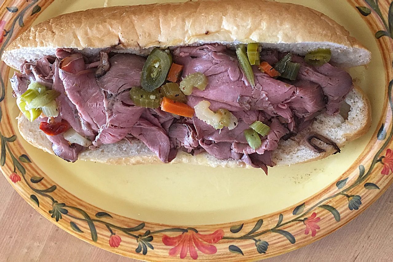 Our Chicago hot beef sub piled high with sliced beef and giardiniera